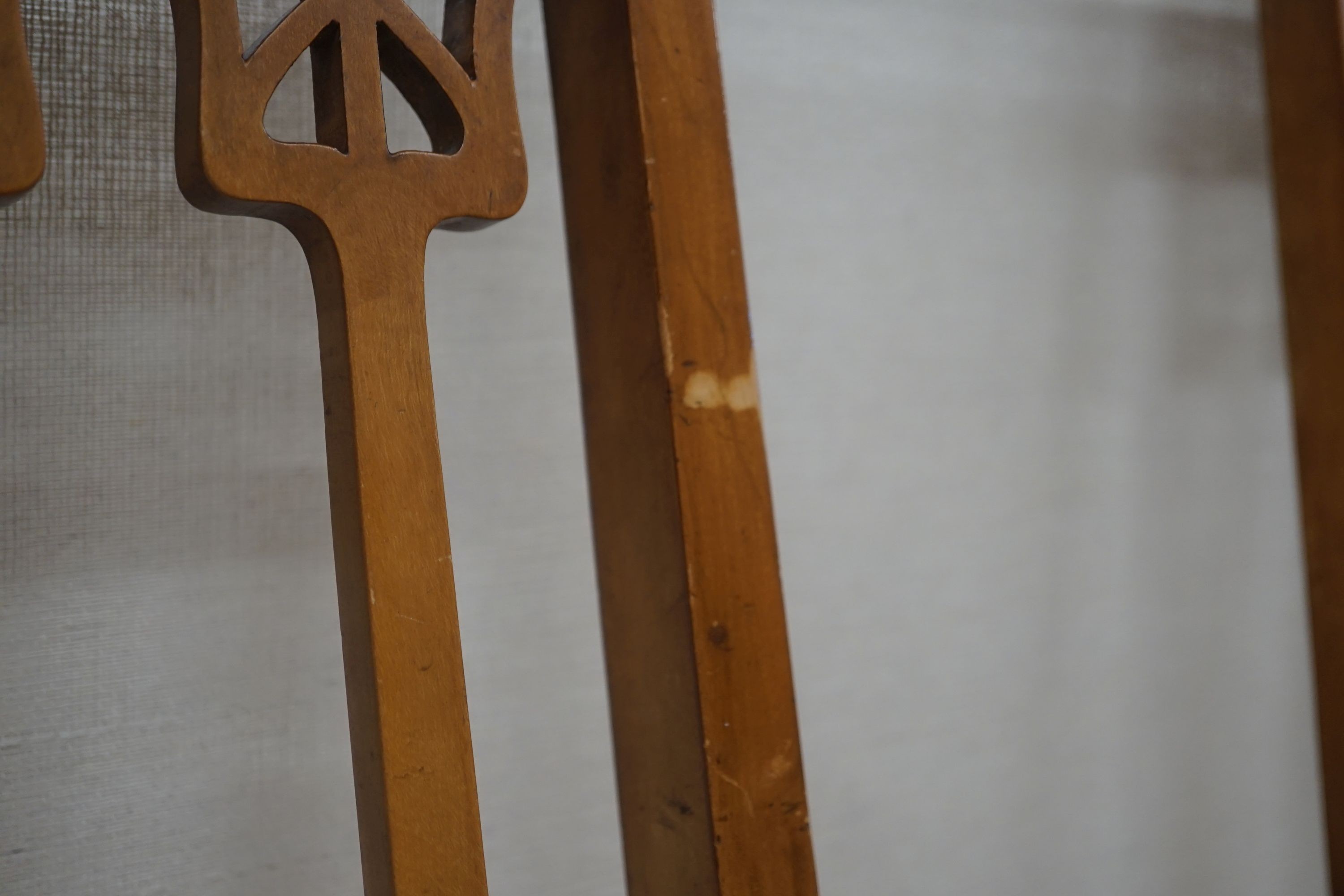 A pair of Art Nouveau inlaid mahogany chairs, one with arms